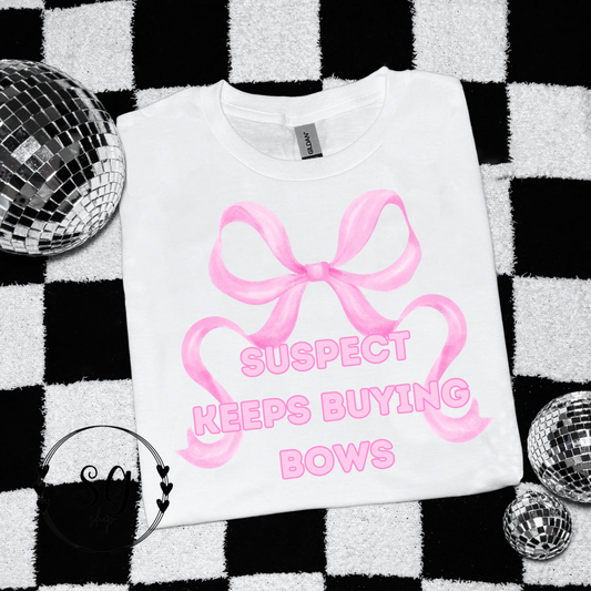 Pink Keeps Buying Bows Tee